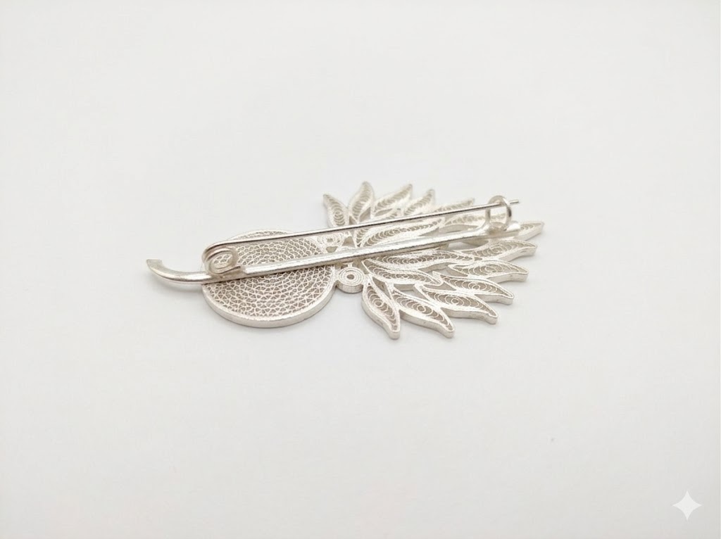 Silver butterfly brooch — presentation variant